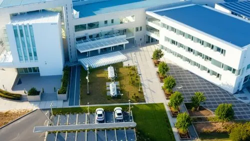 hospital building ,an aerial s of a large building with cars parked outside it,biozentrum,biotechnology research institute,fraunhofer,fachhochschule,technopark,gesamtschule,Photography,General,Realist