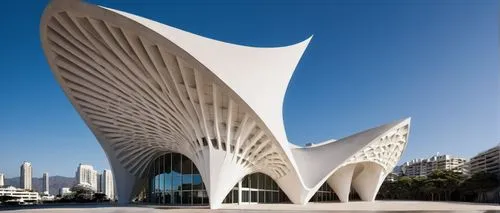 Felix Candela architecture, hyperbolic paraboloid roof, white concrete structure, intricate latticework patterns, geometric shapes, modernist style, brutalist elements, abstract sculptures, urban land