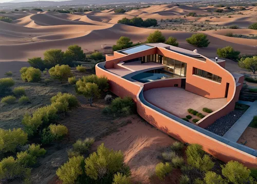 32k, High-quality, Hyper-realistic, perfectly Super design of an earthen dwelling nestled within a desert landscape, blending seamlessly with the surrounding sand dunes. The building’s exterior is con