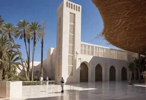 DISEÑO DE UNA MEZQUITA UBICADA EN ARGELIA, COMBINANDO ELEMENTOS DE LA ARQUITECTURA MINIMALISTA, FUSIONADOS CON LA ARQUITECTURA ISLAMICA, USO DE CELOSIAS CON DISEÑO ISLAMICO, MINARETE CON CRISTAL, PROT