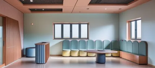 international kids school reception area n waitng area ,this is a room with a long bench and several windows,doctor's room,treatment room,examination room,therapy room,periodontist,hospital ward,hospi