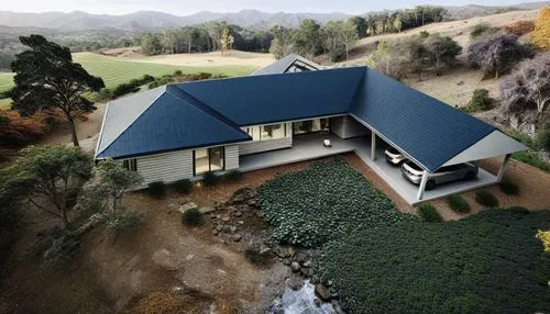 a modern home sitting in the middle of a hill,photogrammetric,house in mountains,pirongia,beautiful home,drone phantom 3,house in the mountains