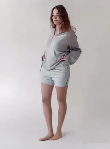 Create a video in which a young girl performs energetic breakdancing moves in a daylight loft studio. The focus is on her athleticism and stylish dance routine, including spins, flips and freezes.,bod