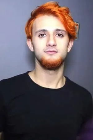 Orange hair and beard,a guy with red hair is standing in front of a grey wall,mutarelli,rongjuan,dwane,half orange,neck,greenscreen