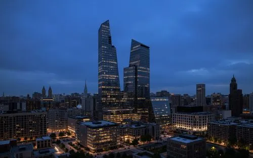 a cityscape at night, featuring two tall skyscrapers in the middle of the image. the buildings are illuminated by the lights of the city,  the cityscape is filled with tall buildings, including the Em