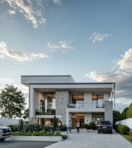 people stand outside of an elegant mansion and driveway,modern house,luxury home,crib,beautiful home,modern architecture,driveway,luxury property,mansion,driveways,large home,modern style,dunes house,