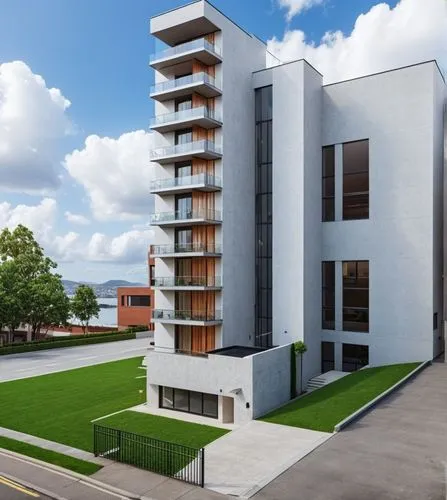 Architecture Design,an art deco building on the waterfront side of the water,penthouses,new housing development,leaseholds,modern architecture,residential tower,modern house,leaseholders,maisonettes,b