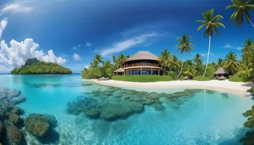 Una preciosa villa tropical situada en una playa bordeada de flores. Cielos azules, un maravilloso día de verano, palmeras y agua cristalina.,a tropical beach house and resort are seen from the water,