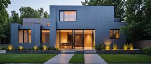 the front of a modern house at night,modern house,cubic house,modern architecture,cube house,house shape,frame house,modern style,metal cladding,contemporary,smart house,beautiful home,glass facade,re