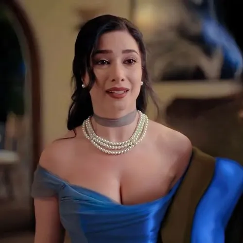 a woman dressed in blue is posing for the camera,jasmine blue,jasmine sky,charmed,pearl necklace,inamorata,elegant,bustier,commercial,jasmine bush,necklace,jasmine,arias,mantilla,callas,latex,see thro