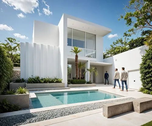 A photo-realistic rendering of a modern, minimalist white house with a contemporary design. the house is situated in a well-manicured garden with a small, rectangular swimming pool in the center. the 