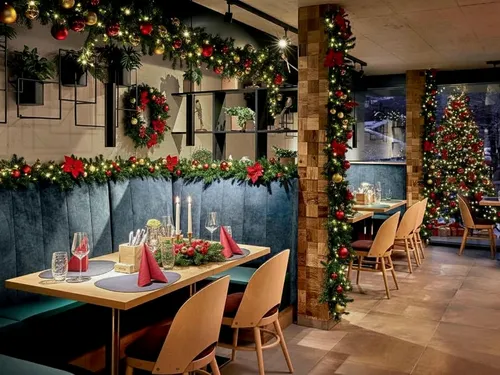 indoor little lights twinkling ,festive decorations,holiday table,decorated,decorations,alpine restaurant,holiday decorations,decorate,hanging decoration,decorously,new york restaurant,restaurant,dini