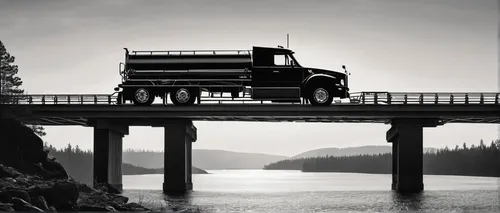 A connected Volvo Truck drives over a bridge in a remote location,ford truck,logging truck,dodge power wagon,long cargo truck,ford cargo,truck driver,pickup-truck,vintage vehicle,autotransport,ford f-