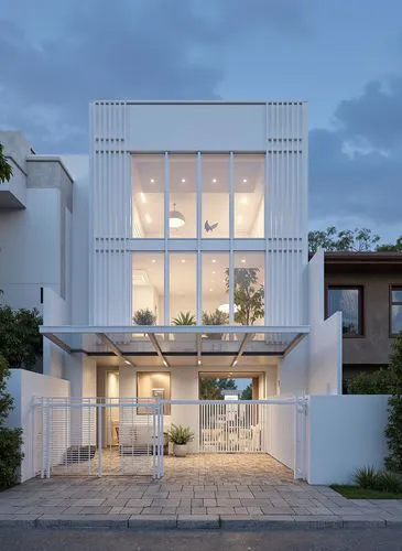 A modern, minimalist architectural building with a large, rectangular glass facade and a white metal gate at the entrance. the building is situated on a street with a clear blue sky and some clouds in