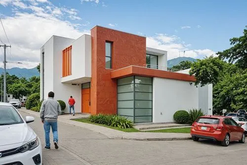 A photo-realistic rendering of a modern two-story building with a combination of white and orange colors. the building has a rectangular shape with a flat roof and large windows on both sides. The ext