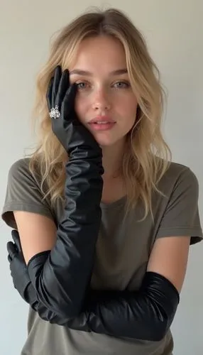 An amateur video captured by the owner of a local glove shop, shared as a screen capture from an Instagram Story to promote the shop’s latest collection of extra-long black leather gloves. The setting