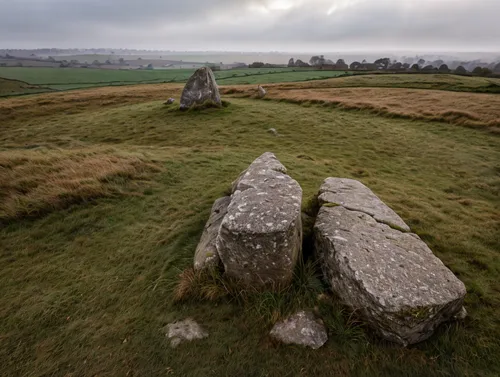 sharp focus, realistic photo, standing stone , neolithic, foggy landscape, English countryside,megalithic,stone circles,chambered cairn,megaliths,stone circle,lanyon quoit,burial chamber,standing ston