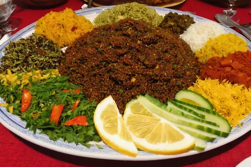 Describe the traditional Eritrean cuisine and its mouthwatering flavors.,ethiopian food,adana kebabı,eritrean cuisine,burji kalifa,machaca,kabab koobideh,injera,kottu,lahmacun,saag,novruz,nasi kuning,