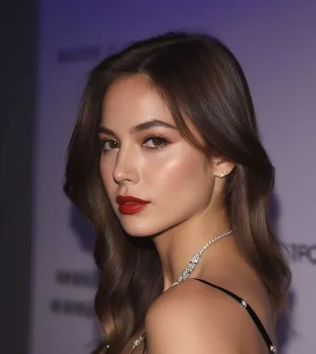 a close up of a beautiful young caucasian woman 23 years old, long brown hair, brown eyes red lips, wearing a elegant black dress, she is sitting in a seat in a teather, she is looking back, turning h