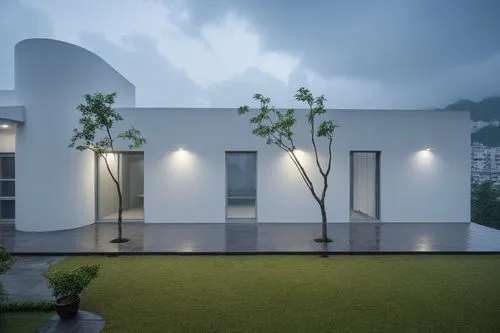 white house and terrace at night on grass,cubic house,cube house,cube stilt houses,residential house,frame house,folding roof