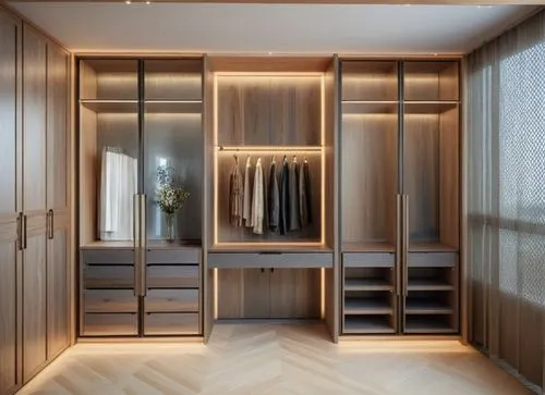  maste wardrobe r ,,,middle is dresser with long mirrior opposite to mirrior is the door of the walkin...show the clothes inisde one side male clotes other side women middle be only mirrior,a walk in 