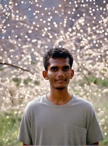 A beautiful boy stand stailish ,devikund,amitava saha,dandelion flying,bokeh effect,kabir,pakistani boy,ixora,mumuration,background bokeh,indian jasmine,indian monk,bangladeshi taka,dandelion field,be