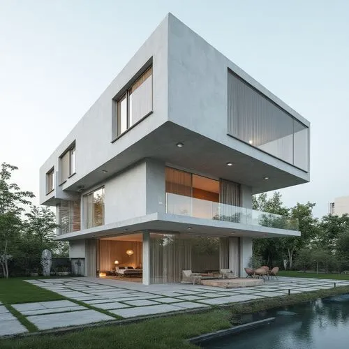  ,the house has a large balcony and glass windows,modern house,cube house,modern architecture,cubic house,residential house,house shape