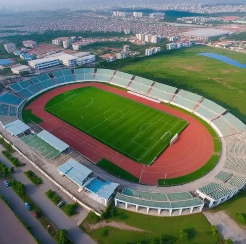 Yakubu Gowon Stadium, 16000 seating capacity. The stadium has markings for a soccer pitch, and the surrounding track for athletics.  with parking lots, greenery The stadium is situated within an urban