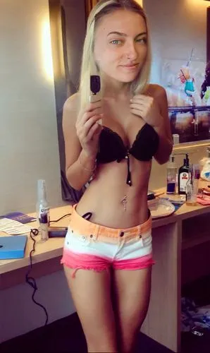 a girl taking a selfie in her underwear and underwear,bellybutton,poppycock,petite,edit,fish eye,abs