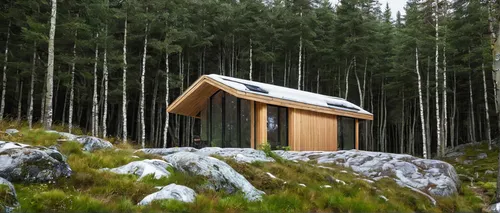 Exterior, Cabin Building Type, Curved RoofLine, Prefab Building Type, Green Roof Material, and Wood Siding Material The Bjellandsbu, a 376-square-foot hunting cabin located in western Norway. Designed