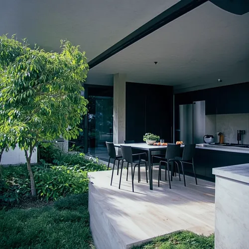 cocina minimalista,some chairs that are next to a table and a tree,mid century house,modern kitchen,modern kitchen interior,contemporary decor,landscaped,interior modern design,home interior,mid centu
