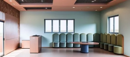 international kids school reception area n waitng area ,the room has rows of chairs, a podium, and windows,therapy room,treatment room,examination room,doctor's room,periodontist,conference room,consu