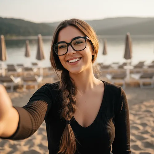 high resolution photorealistic selfie, attractive young woman with long loose waves in chestnut brown hair with subtle highlights, hair gathered into a casual low side braid, large square black-framed