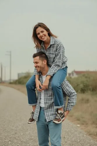 woman sitting on man's shoulders,the man is carrying his girlfriend on his back,pre-wedding photo shoot,love couple,as a couple,piggyback,beautiful couple,vintage man and woman