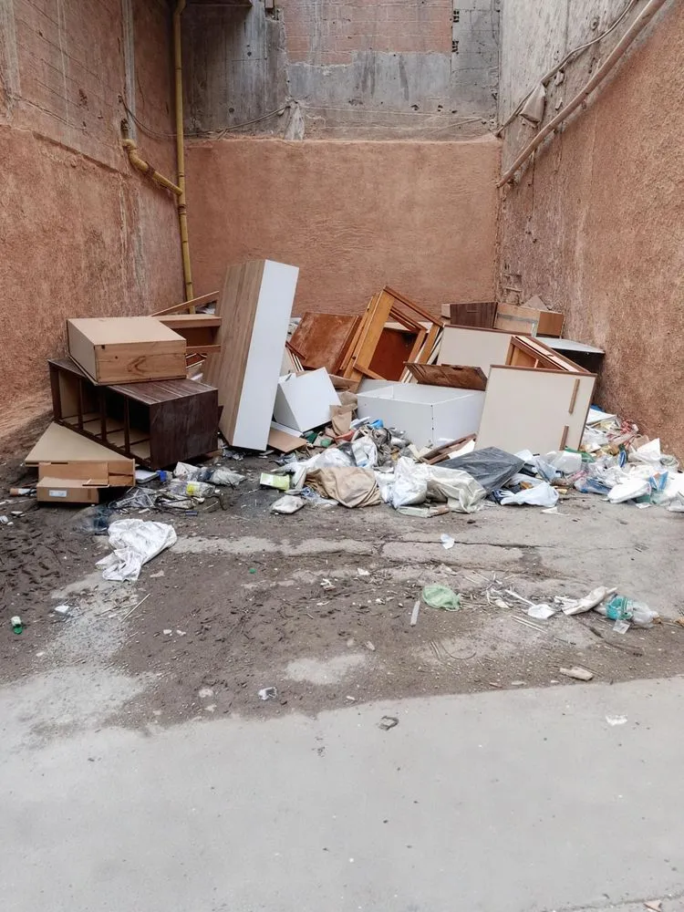 the rubble is all around the corner by the doors