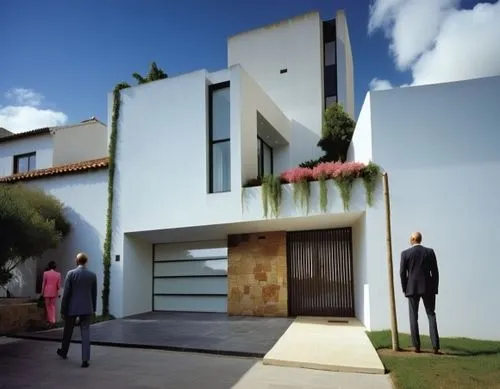MURO DE CONCRETO COLOR BLANCO,two men looking into an open air garage,fresnaye,modern house,residencial,cubic house,residencia,vivienda,residential house,dunes house,exterior decoration,cube house,3d 