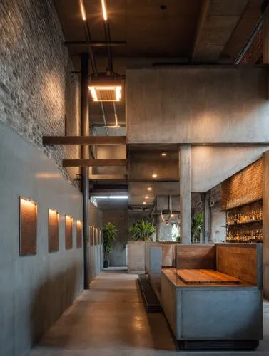 concrete ceiling,associati,exposed concrete,corten steel,loft,lofts,concrete slabs,modern kitchen interior,modern kitchen,contemporary decor,corian,chefs kitchen,interior modern design,wooden beams,si