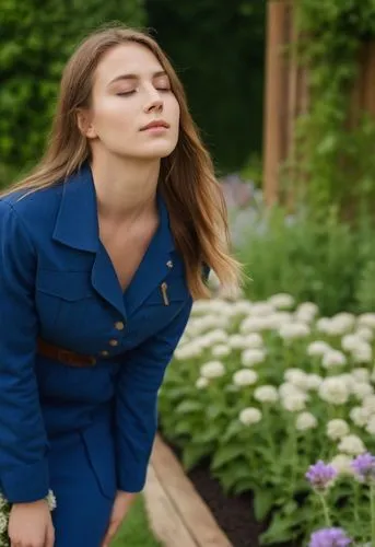A photograph full body of a beautiful caucasian young woman, 23 years old, with long, flowing brown hair over her shoulders, closed eyes. She is wearing a blue Mechanicc uniform whit open closure and