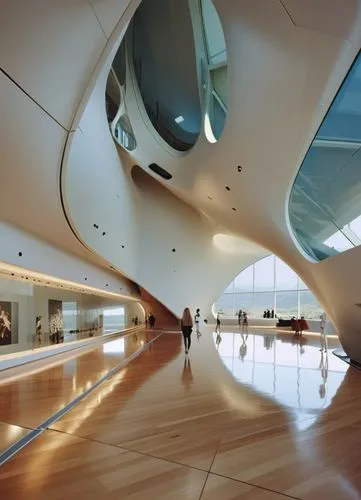 interior of a museum by Zaha Hadid, award winning design,  highly detailed,a building with people walking inside and looking into the sky,futuristic art museum,futuristic architecture,hall of nations,