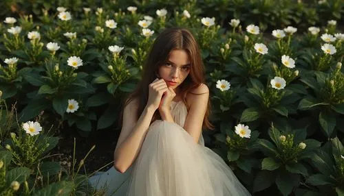 a close-up of a woman with long straight brown hair, wearing a transparent long skirt with multiple layers and white lining, her left hand resting diagonally across her face, she is looking directly a