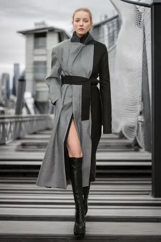 black coat,coat,woman in menswear,long coat,trench coat,overcoat,futuristic,imperial coat,menswear for women,mags,tilda,women fashion,bolero jacket,fashion vector,fashion street,vogue,female model,gun