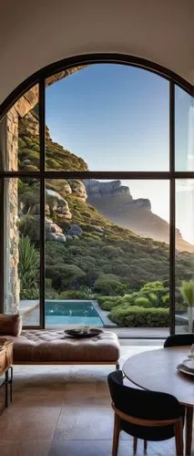 Luxury modern villa, South African style, Mediterranean influence, curved lines, large windows, sliding glass doors, high ceilings, wooden floors, open-plan living area, spacious interior, natural sto