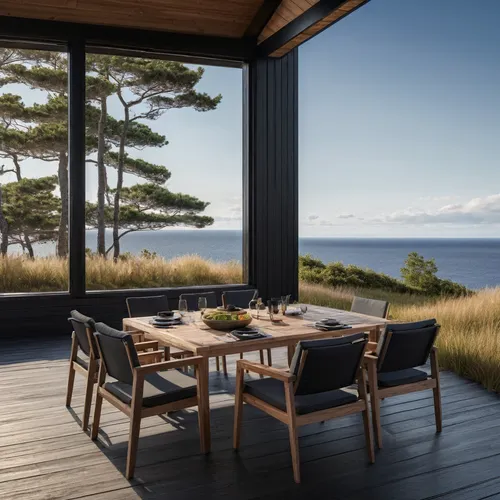outdoor table and chairs,dunes house,outdoor dining,outdoor furniture,summer house,outdoor table,wooden decking,danish furniture,house by the water,patio furniture,breakfast room,window with sea view,