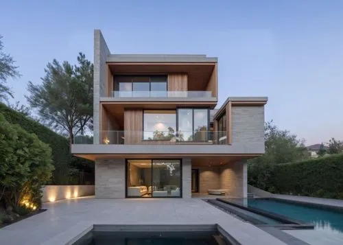 a very large house next to a big pool,modern house,modern architecture,dunes house,cube house,cubic house,luxury property,house shape,beautiful home,house by the water,contemporary,luxury real estate,