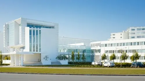 hospital building ,a large white building with many windows next to grass,biotechnology research institute,phototherapeutics,university hospital,technopark,medical center,klinikum,Photography,General,