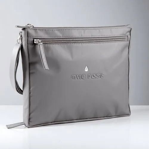 A sleek, modern zipper pouch lying flat on a clean white surface, crafted from matte gray fabric with subtle texture. The pouch features a hidden, smooth zipper with a metallic pull in a matching gray