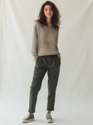 an asian woman in grey sweatshirt and dark green pants,khaki,menswear for women,crewcuts,sweatpants,trousers,women's clothing,women clothes,dounia,culottes,womenswear,khakis,sweatsuit,sage green,fatig