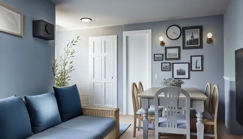 a living room with light blue walls and various framed pographs,home interior,interior decoration,decorator,hallway space,tikkurila,modern decor