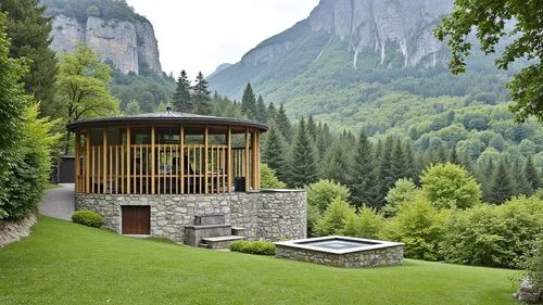 a well sits on the lawn in a valley,house in the mountains,house in mountains,chalet,summer house,mountain hut,svizzera,amanresorts,swiss house,pool house,private house,the cabin in the mountains,beau