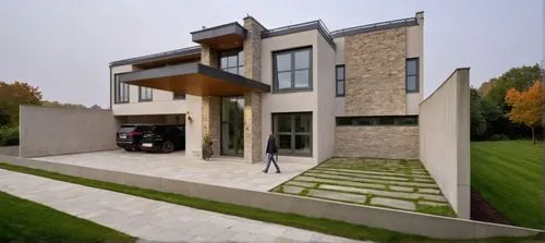PLAFON LUMINICO
,the car is parked outside of this contemporary home,modern house,cube house,modern architecture,cubic house,dunes house,residential house